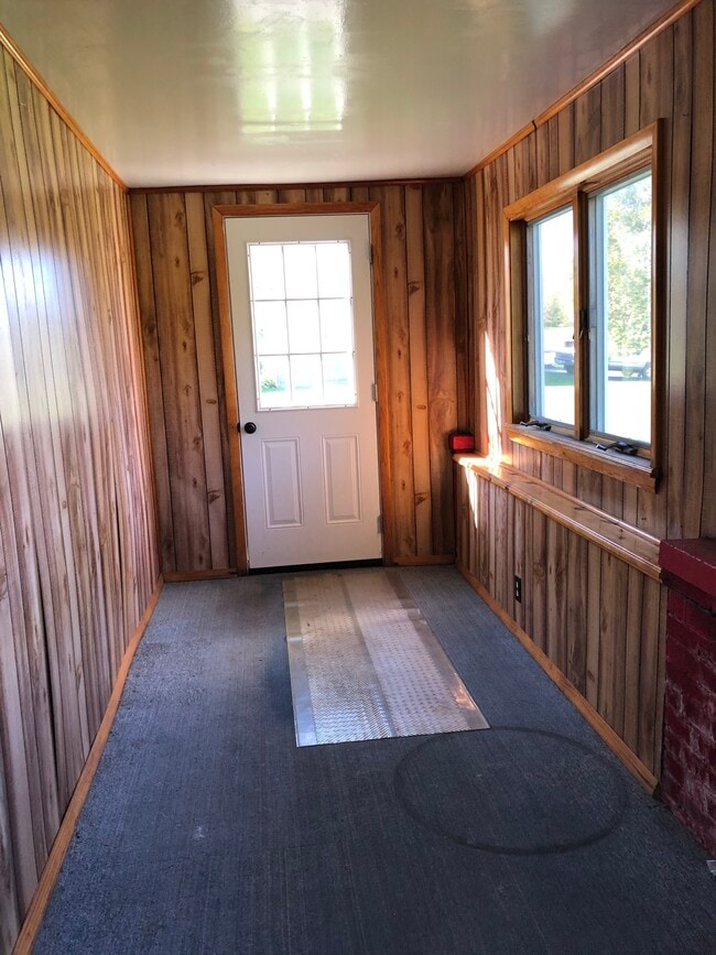 Enclosed front porch - 3923 County Route 57