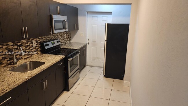 Photo - 1210 NW 30th Ave Unit 1-3