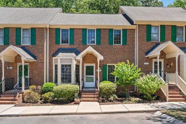 Building Photo - 4BR Brick Townhome in Woodcroft with Deck & Wooded Views