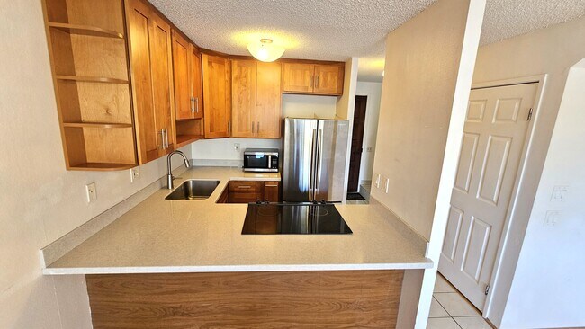 Photo - Koolau Vista! Kailua Town convenience. 2 bed, 1.5 bath, 1 covered parking! Unit A-239