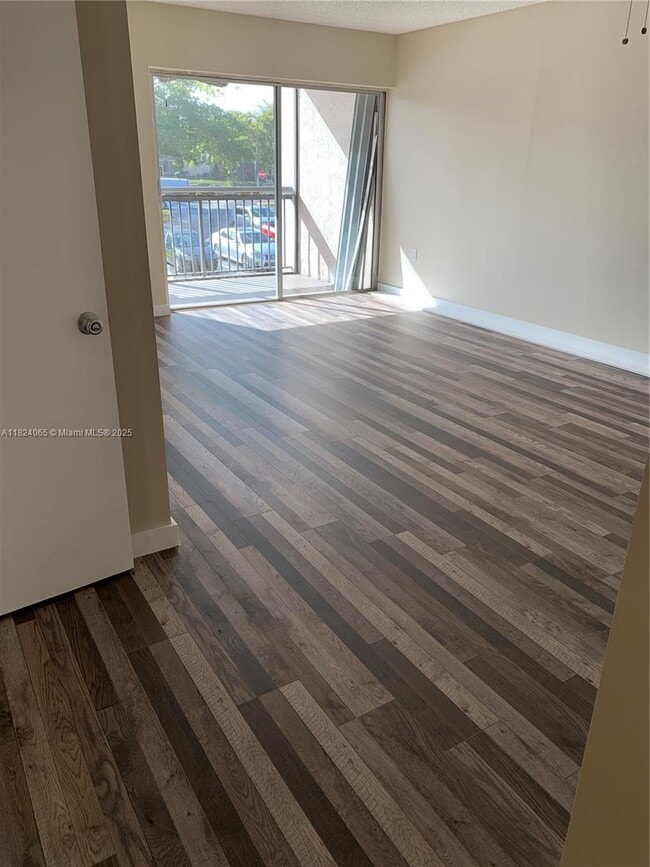 Photo - 711 N Pine Island Rd Condo Unit 209