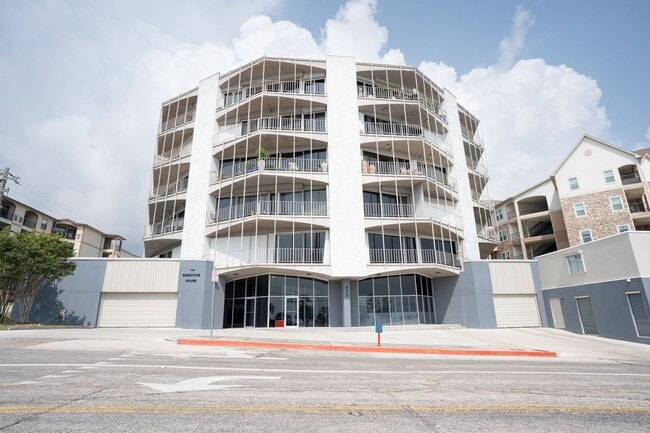 Building Photo - Sprawling 5th-Floor Corner Condo Just Steps from McGee Beach