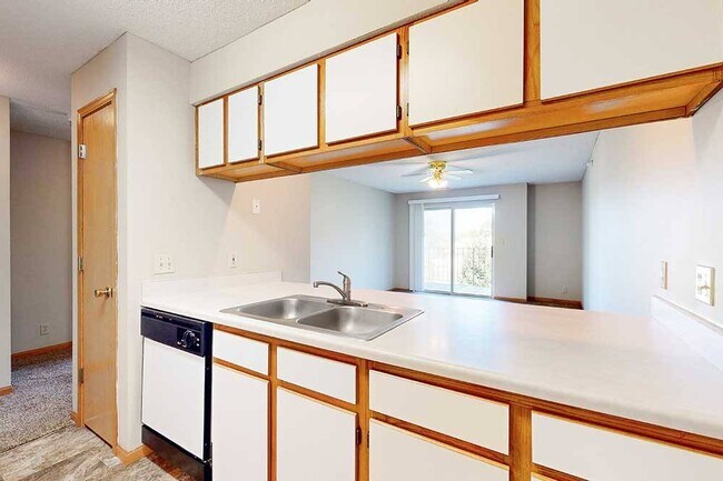 Pass-through kitchens keep cooking and conversation connected while offering generous counter space for everyday meals.