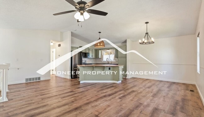 Photo - Updated 4 Bed, 2 Bath Home in Briargate with Mountain Views, fully fenced yard, 2 car garage and AC