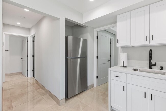 Hallway to bedroom and door to in unit washer & dryer - 6038 W 75th St