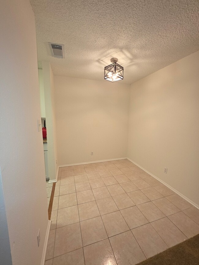 Building Photo - 7900 N Stadium Dr Unit 106