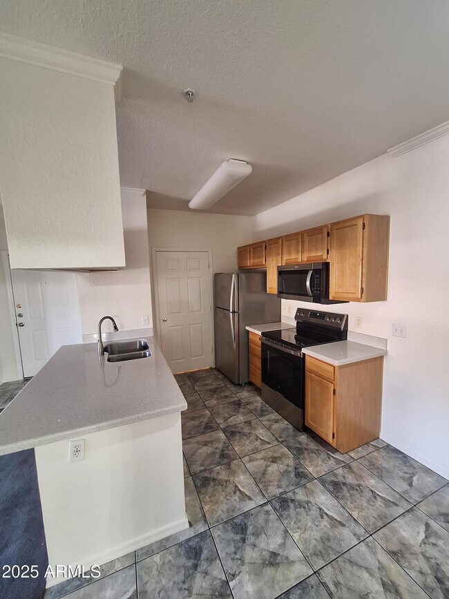 Photo - 5401 E Van Buren St Unidad 2042