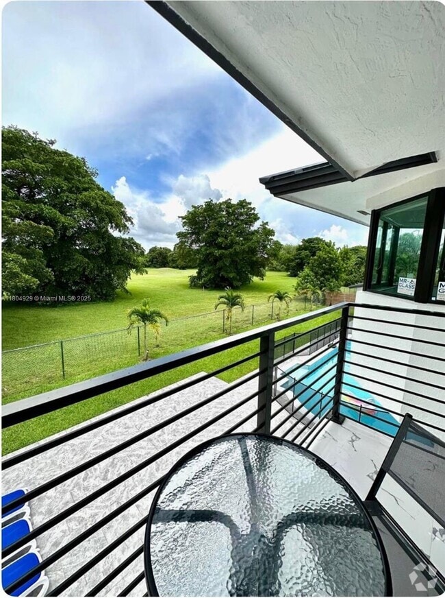 Building Photo - 9410 E Calusa Club Dr Rental