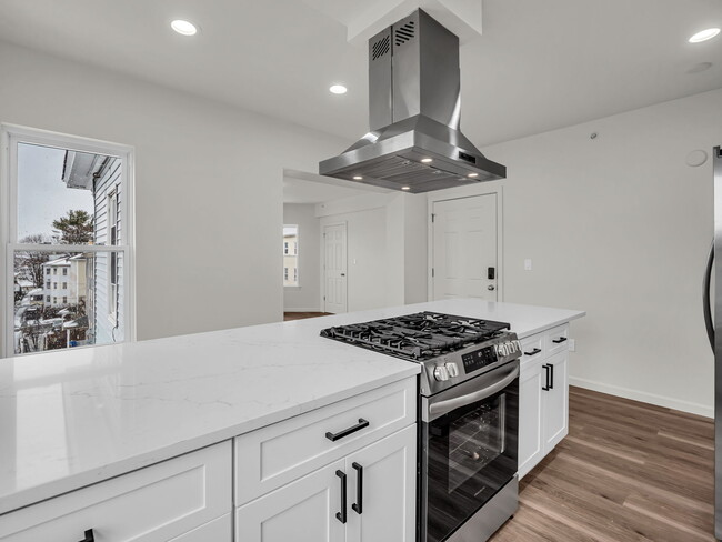 Kitchen - View of Entry - 12 Alpine St Apartments Unit 3