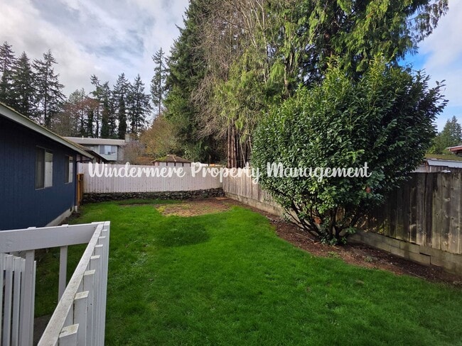 Photo - 3 bed Rambler in Convenient CK location with fully fenced yard and large deck