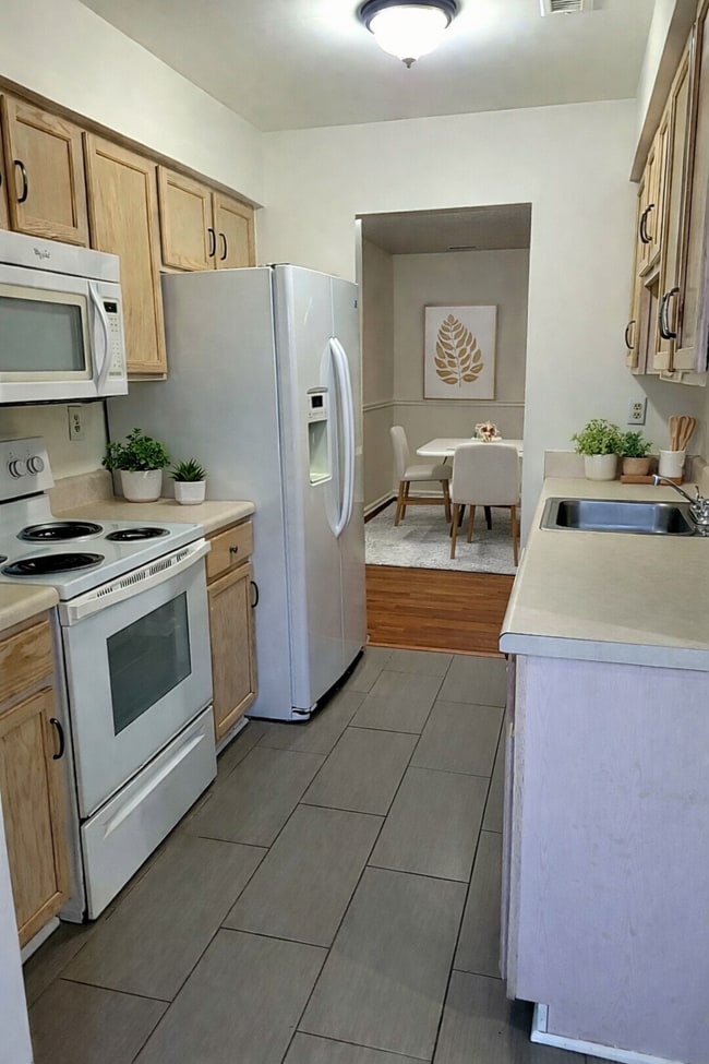 Photo - Spacious 3BR Townhome • $2,150 • Fenced Yard + Bonus Room • Prime Location