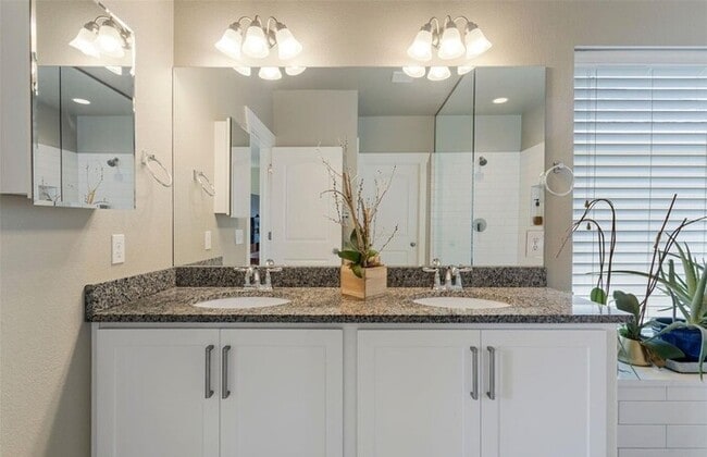 Photo - Modern 3BR Home with Finished Basement & Private Courtyard in Lowry