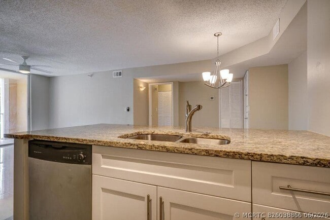Building Photo - 140 Yacht Club Way Unit 206