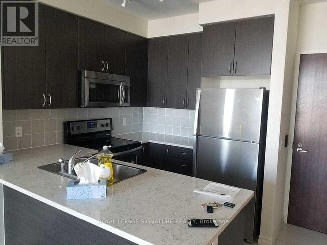 Photo - 339 Rathburn Rd W Unit PH-03