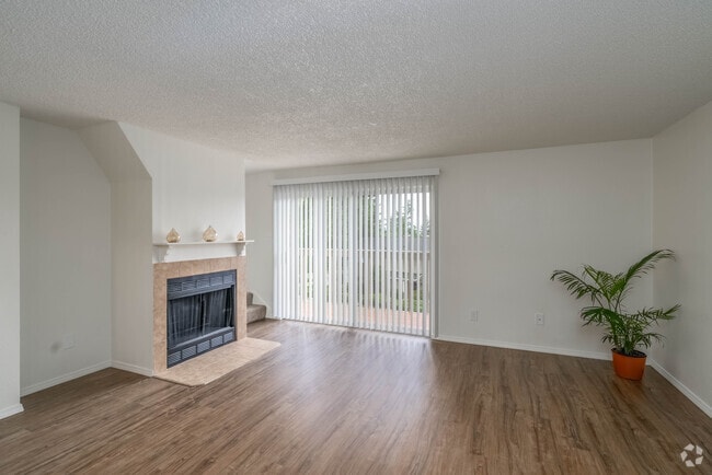3BR, 1.5BA - 1,060SF - Living Room - Scarborough Townhomes