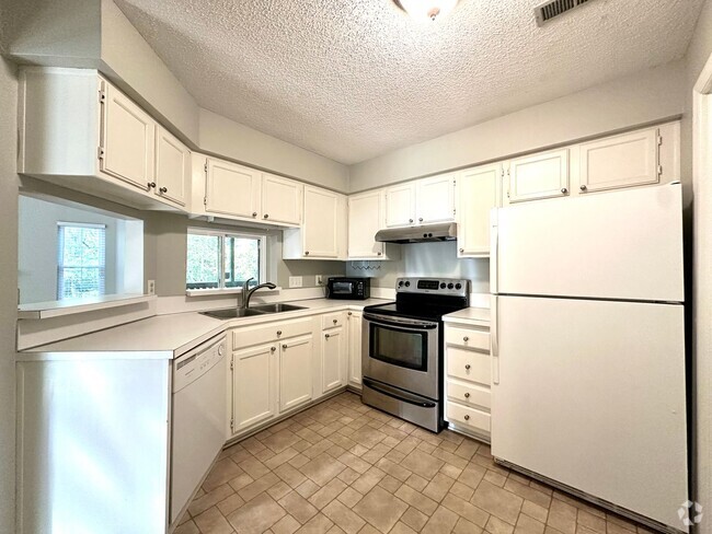 Building Photo - **MOVE IN SPECIAL!**Charming 2BR/2BA Condo...