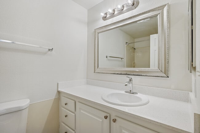 Classic Package III bath with laminate countertop and white cabinetry