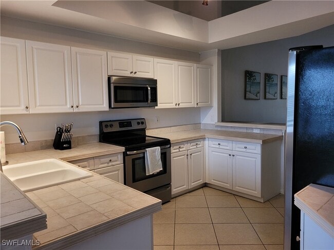 Building Photo - 13831 Eagle Ridge Lakes Dr Unit 202 Rental