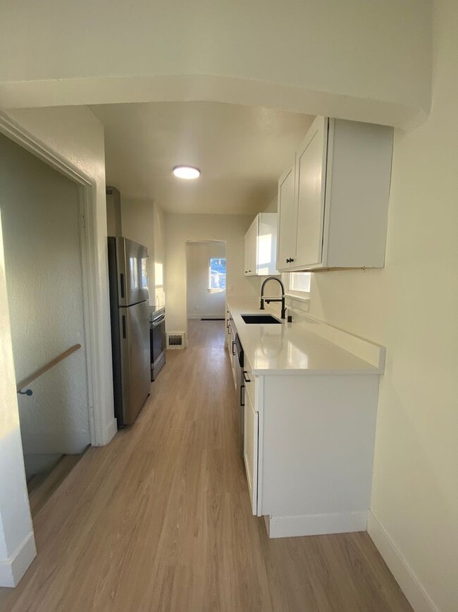 Photo - Move in special ONE month free – Spacious 4-Bedroom, 2-Bath Home in Spokane Valley