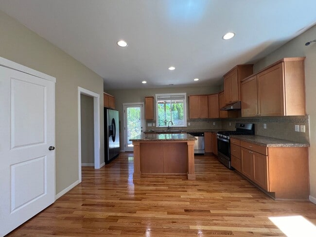 Photo - Spacious 4 Bedroom Home with Zen Backyard and 3-Car Garage