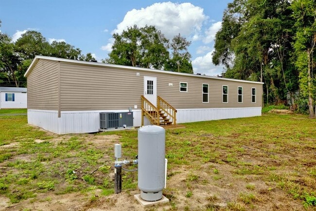 Building Photo - 8595 NW 13th Ct