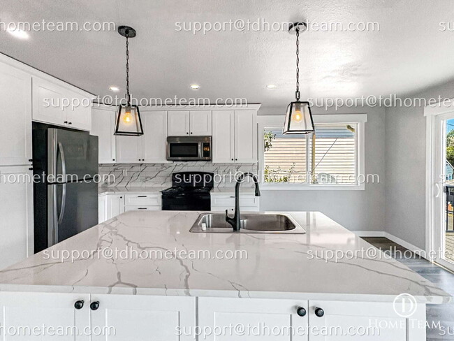 Photo - "Charming 4-Bedroom Home with Scenic Views & Finished Basement in Renton!"
