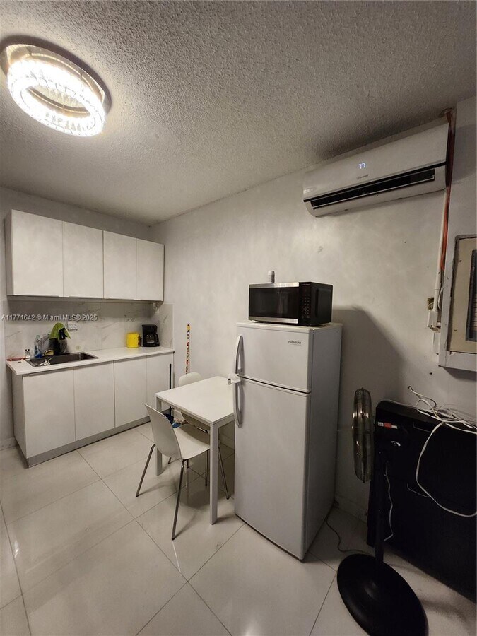 Photo - 18088 SW 137th Path Unit 0