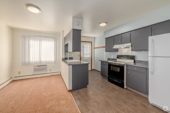 2BR, 1.5BA - 1,033SF - Kitchen and Dining Room