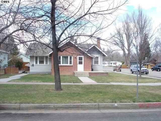 Front of home, entry to left - 338 E Pitkin St Unit B