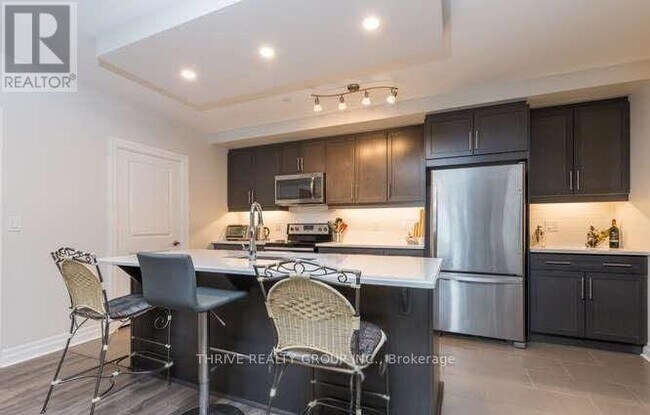 Photo - 260 Villagewalk Blvd Unité 707