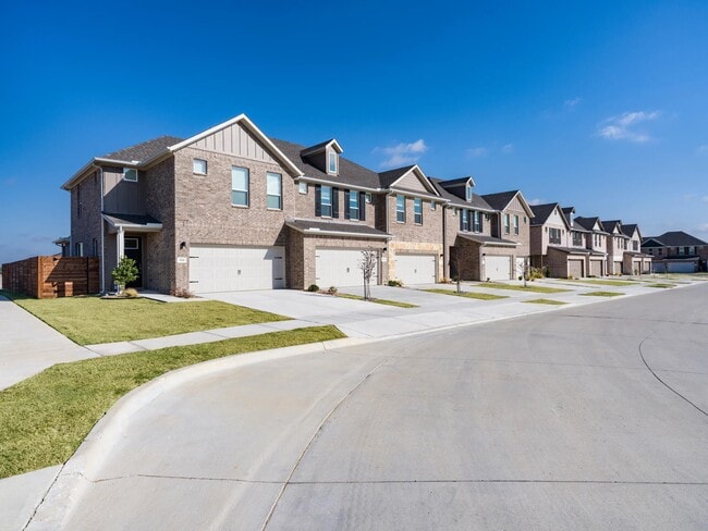 Our thoughtfully designed homes with attached garages create a clean streetscape that balances privacy, functionality, and everyday comfort. - Amavi Celina