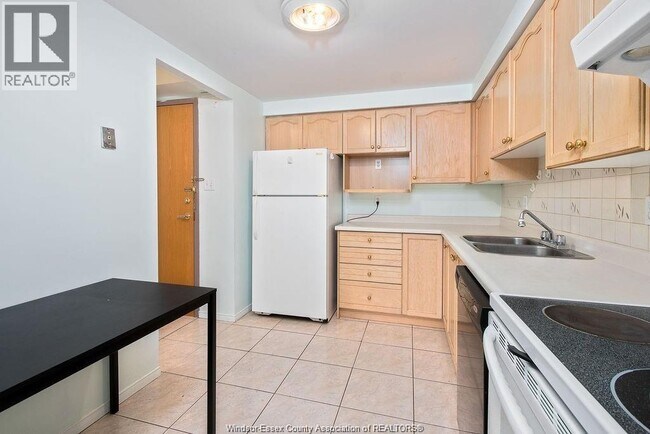 Photo - 401 Grand Marais Rd W Unité 206