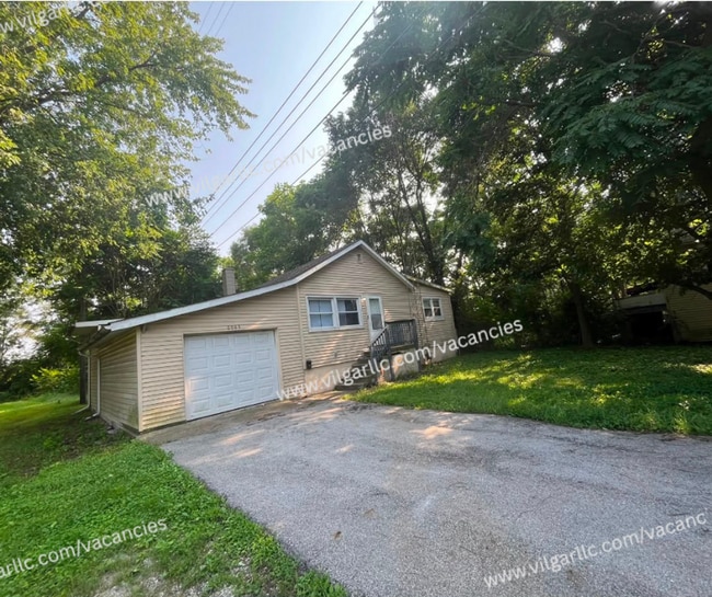 Building Photo - 6065 E 6th Pl