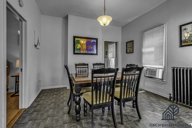 Photo - Furnished 2-Bedroom Second-Floor Apartment Near Elmwood Village Unit 2