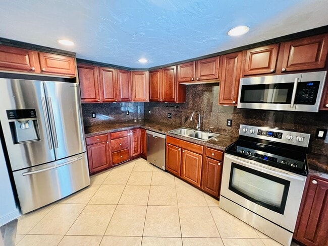 Photo - UNIVERSITY HILLS, CHARMING RANCH HOME, UPDATES THROUGHOUT, 3 BED, LARGE YARD, DECK AND PERGOLA .