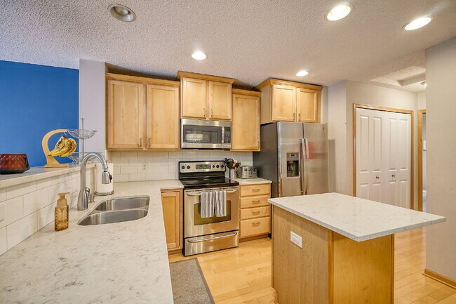 Photo - Spacious 4-Bedroom, 4 Bathroom Plymouth Townhouse with Cozy Fireplace - 2510 Sq Ft of Comfort!