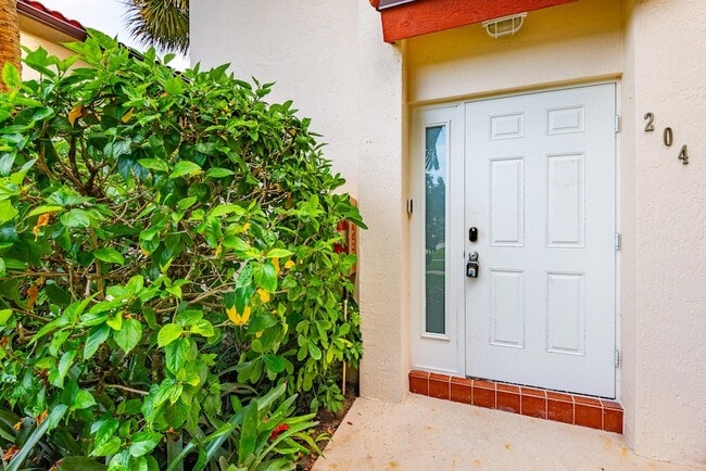 Building Photo - 380 NW 67th St Unit J204