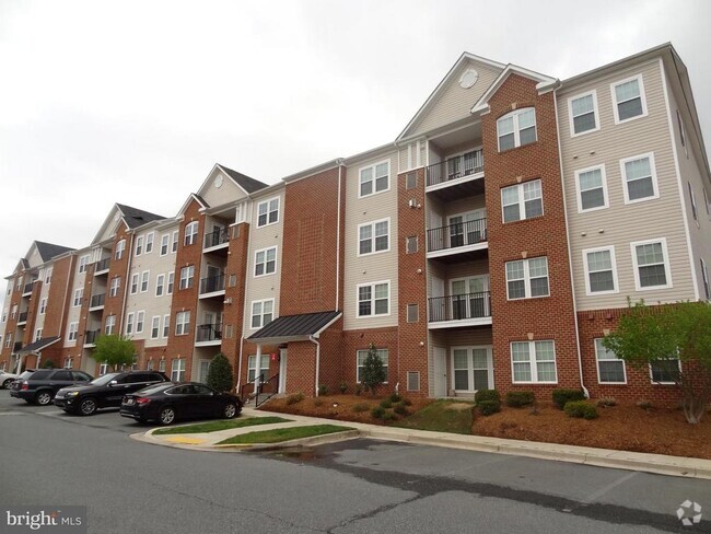 Building Photo - 7557 Stoney Run Dr Unit 303 Rental