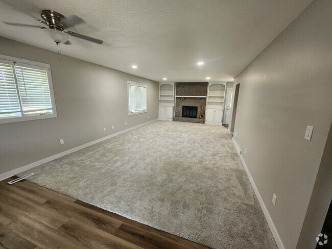 Living room with fire place - 4660 NW 62nd Ave Rental