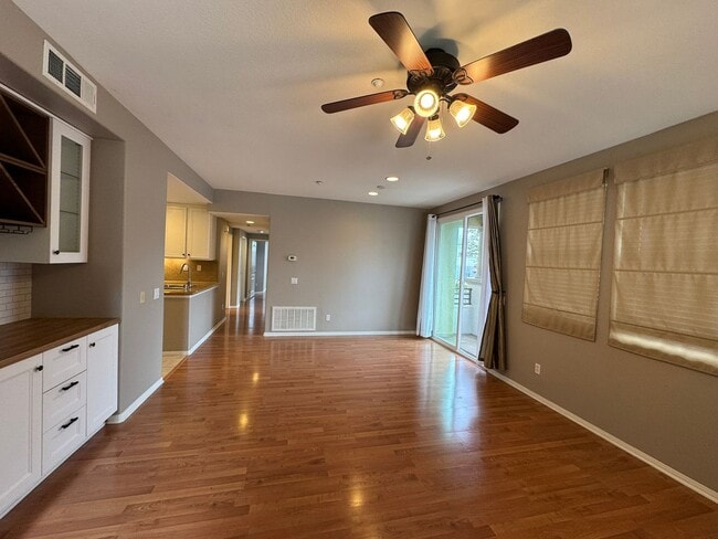 Photo - Sleek 2-Bed with a Den/Office + Flex Corner Condo with Attached Tandem Garage