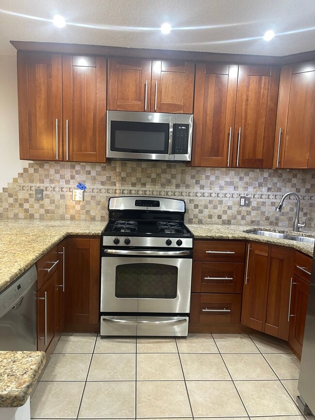 Building Photo - 8970 N Parkside Ave Unit 404 Rental