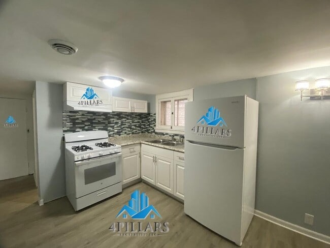 Photo - Charming 2 Bedroom, 1 Bath Apartment for Rent Unit Downstairs