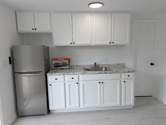 Photo - 1909 E 99th Ave