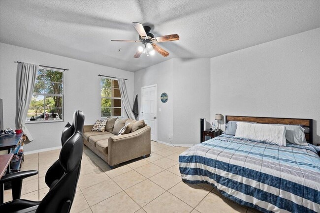 Photo - 335 E Thatch Palm Cir Unit 104