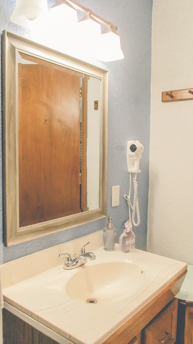 Wall mounted hair dryer - 8301 Comanche Ct NE
