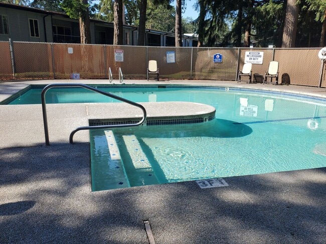 Building Photo - 8521 Zircon Dr SW Unit #063