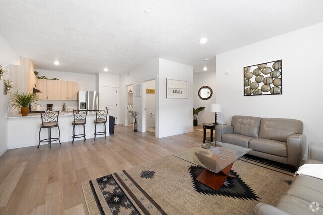 2 habitaciones, 1,5 baños, 1060 pies cuadrados, sala de estar - Autumn Leaf Apartments 55+ Community