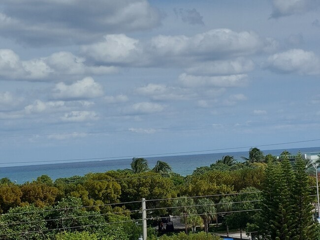 Building Photo - 8000 Harding Ave Unit 6A