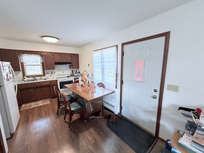 Photo - Stylish Townhome-Style 1BR with Patio, Garage & In-Unit Laundry!