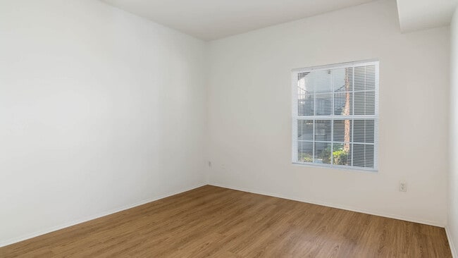 Bedroom with Hard Surface Flooring - Ridgewood Village